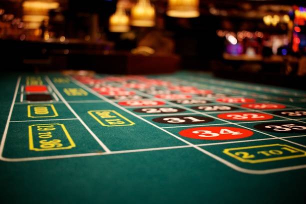 Live Sic Bo dealer studio with three dice and betting layout